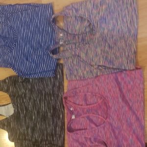 lot of 4 workout tanks. xersion